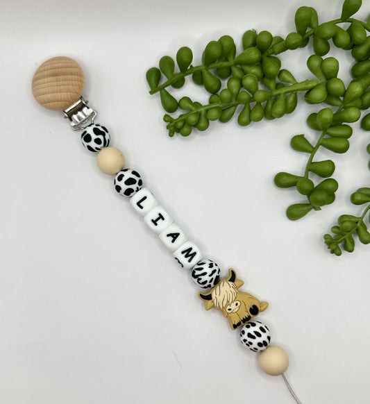 Moo X Cream Cow Pacifier Clip